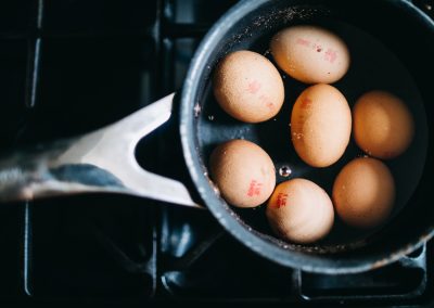 eggs boiling in a pan