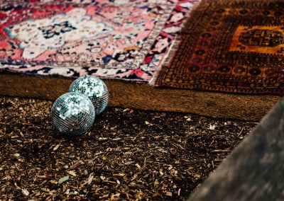 disco balls on vintage rugs